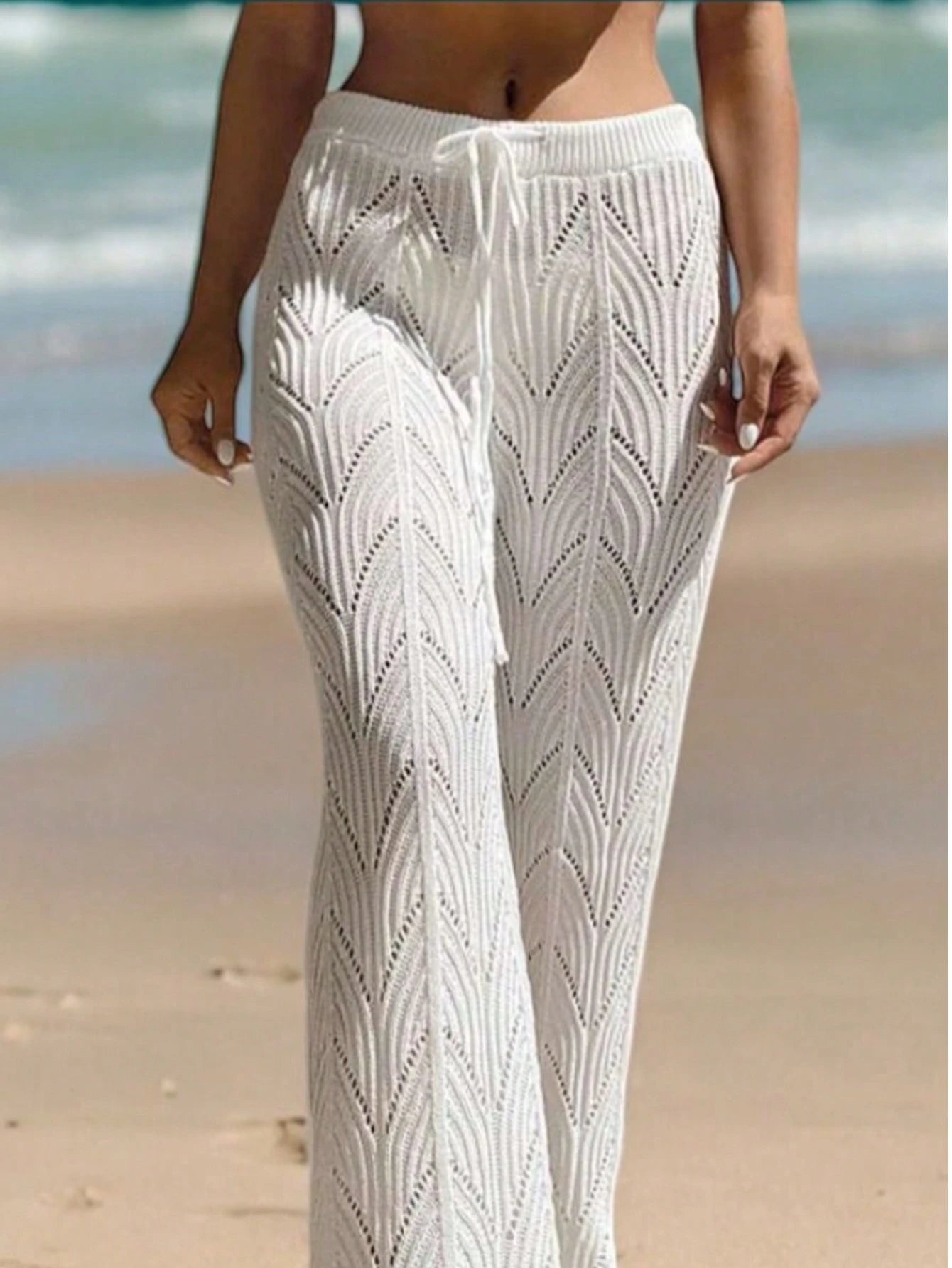 Vendedor Indicado
Calça Saída de praia Pantalona Cintura alta Tricot Crochê Moda Praia Verão Regulagem Rendada Zig Zag